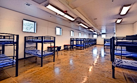 A homeless shelter with bunk beds.